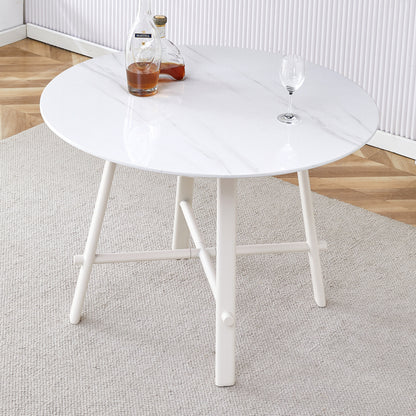 A modern minimalist circular dining table with a 42 inch diameter white patterned tabletop and white metal legs. Suitable for restaurants, living rooms, and conference rooms.W1151P152778 SolidRoot Buy Furniture USA