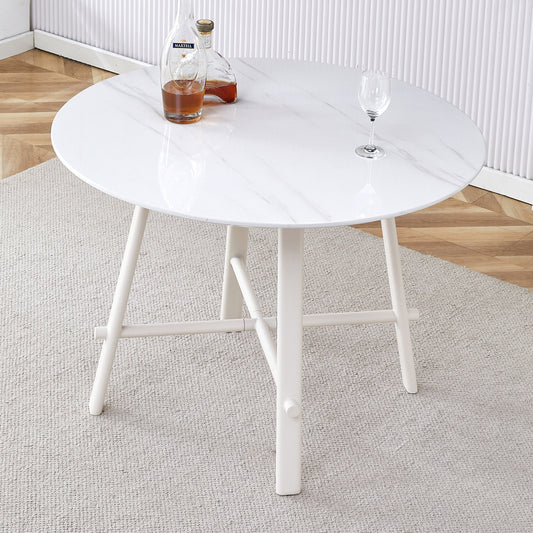 A modern minimalist circular dining table with a 42 inch diameter white patterned tabletop and white metal legs. Suitable for restaurants, living rooms, and conference rooms.W1151P152778 SolidRoot Buy Furniture USA