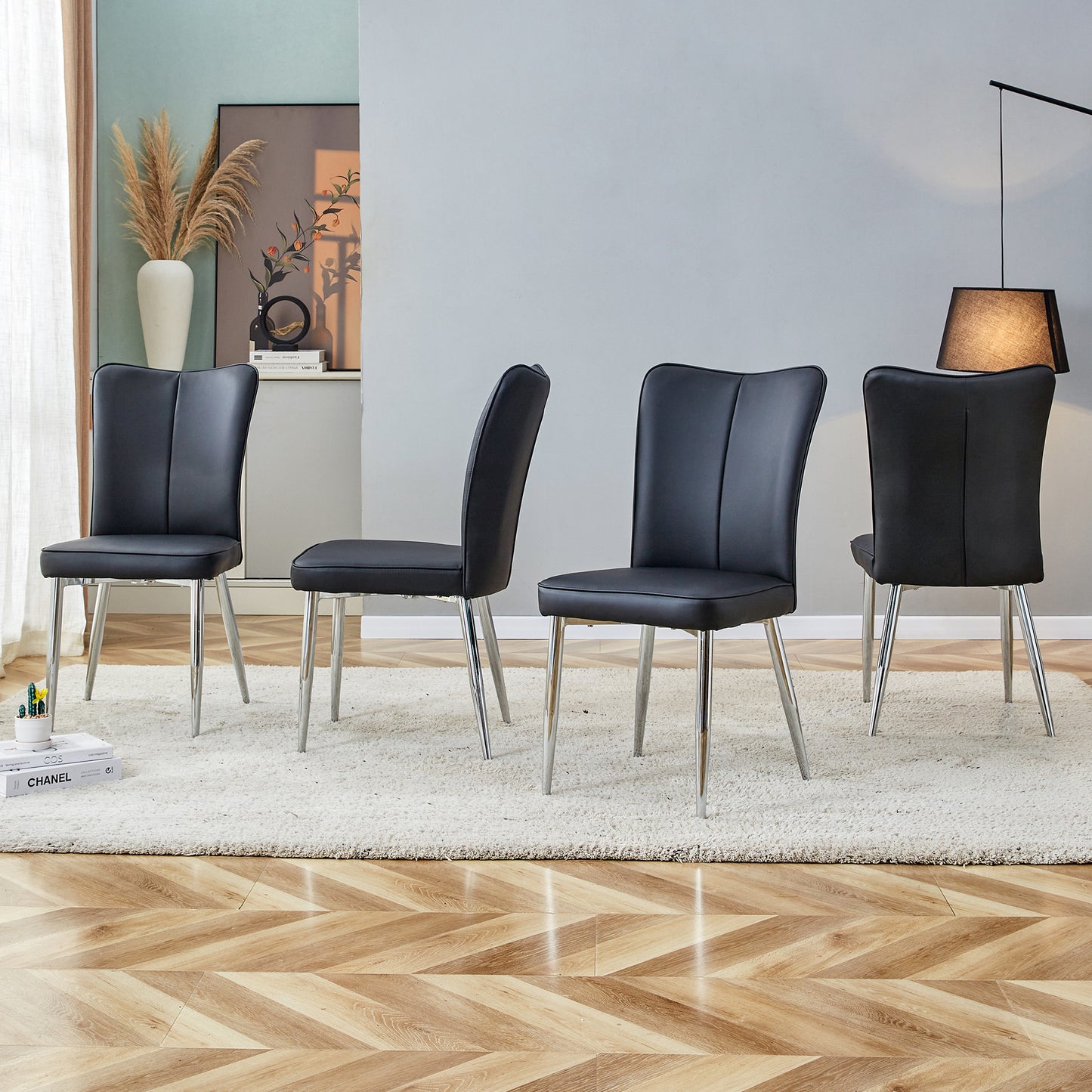 Modern minimalist dining chairs, black PU leather curved backrest and seat cushions, electroplated metal chair legs, suitable for restaurants, bedrooms, and living rooms. A set of 4 chairs. SolidRoot Buy Furniture USA